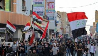 مظاهرة لإحياء ذكرى احتجاجات تشرين بالعراق- ا ف ب