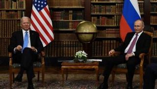 الرئيسان الأمريكي والروسي خلال لقاء سابق
