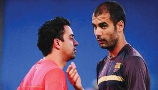 بيب جوارديولا وتشافي هيرنانديز في برشلونة