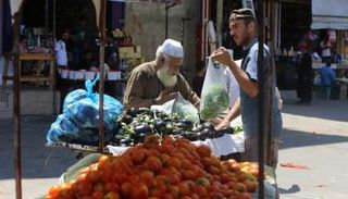 بائع خضروات في أحد شوارع فلسطين