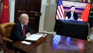 الرئيس الأمريكي جو بايدن ونظيره الصيني شي جين بينغ - أ.ف.ب