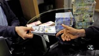 تباين أسعار العملات والذهب في ليبيا