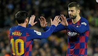 ليونيل ميسي وجيرارد بيكيه