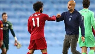بيب جوارديولا ومحمد صلاح