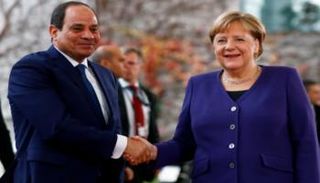 السيسي وميركل في لقاء سابق