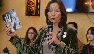 مريم البوزيدي العراقي رئيسة فريق ابتسامة رضا