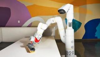 صورة أرشيفية لروبوت منزلي ينظف