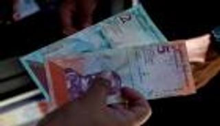 بعد انهيارها.. غرض وحيد تشتريه عملة فنزويلا