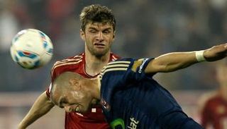 وائل جمعة وتوماس مولر