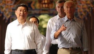 لقاء سابق بين بايدن وجين بينغ- أرشيفية