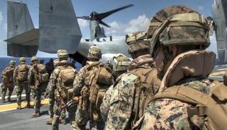 قوات من التحالف الدولي تستعد لتنفيذ مهمة عسكرية