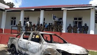 عدد من عناصر داعش عقب هجوم على مركز للشرطة- أرشيفية