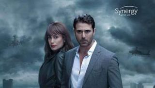 أحمد عز وهند صبري في ملصق "هجمة مرتدة"