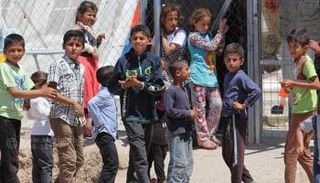 أطفال عراقيون في أحد المخيمات - أرشيفية