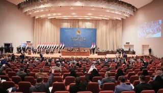 االجانبات العراي والصيني خلال توقع اتفاقية في العاصمة بكين