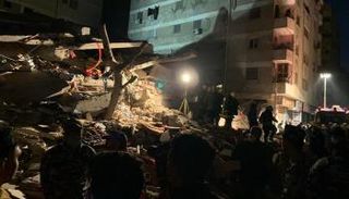 تواصل جهود البحث عن أحياء تحت أنقاض العقار