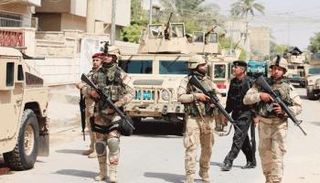 انتشار قوات من الجيش العراقي في أحد شوارع بغداد - أرشيفية