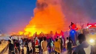 جانب من حريق مخيم 