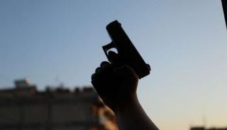 عراقي يطلق النار على طليقته بسبب 100 دولار- أرشيفية