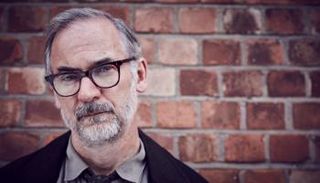 الممثل البريطاني بول ريتر