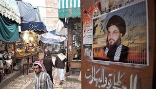 صورة حسن نصر الله في أحد شوارع صنعاء 