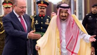 العاهل السعودي والرئيس العراقي في لقاء سابق