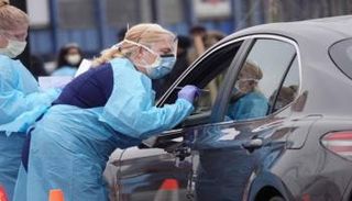 اختبار فيروس كورونا من السيارة بأمريكا