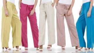 السروال الكتان بالألوان الزاهية يتربع على عرش موضة الصيف