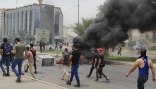 عناصر الحشد خلال مظاهرات سابقة في بغداد