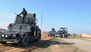 قوة أمنية خلال عمليات ملاحقة لداعش في العراق