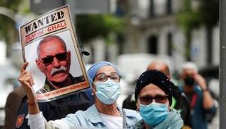 محتجون على جرائم زعيم البوليساريو أمام محكمة إسبانية- رويترز