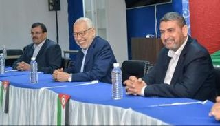 سامي أبو زهري خلال لقاء راشد الغنوشي