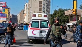 قوات أمن عراقية بموقع انفجار سابق في بغداد