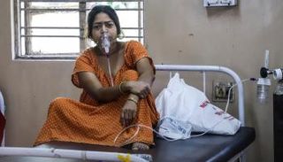 مريضة بفيروس كورونا في الهند