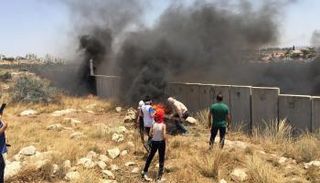 جانب من المواجهات بين فلسطينيين والجيش الإسرائيلي بالضفة الغربية