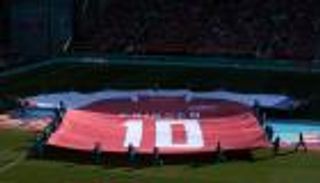 بالصور.. كريستيان إريكسن يوحد جماهير يورو 2020