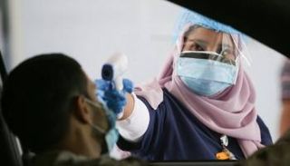 فحص كورونا من السيارة بالإمارات