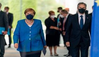 أنتوني بلينكن وأنجيلا ميركل - أ.ف.ب