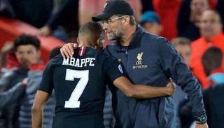 كيليان مبابي نجم باريس سان جيرمان ويورجن كلوب مدرب ليفربول