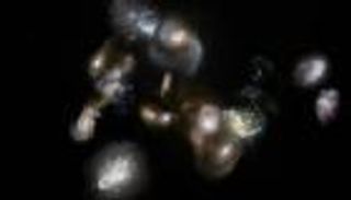 عنقود مجرات "بدائي" يبوح بالأسرار.. كتلته تفوق الشمس تريليون مرة 