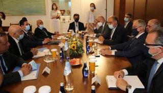 جانب من لقاء صالح وزير الخارجية اليوناني - مجلس النواب الليبي