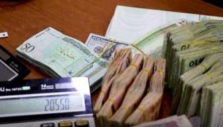 أحد الصرافات في ليبيا - أرشيفية