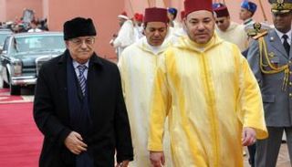 الملك محمد السادس والرئيس محمود عباس