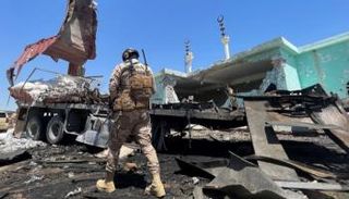 أحد أفراد الأمن العراقي في موقع استهدفته المليشيات - فورين بوليسي