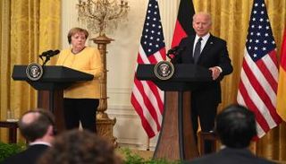 بايدن وميركل خلال اللقاء - أ.ف.ب