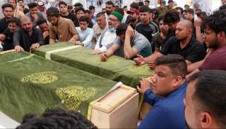 جثامين ضحايا من حريق الناصرية خلال مراسيم التشييع