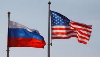 العلمان الأمريكي والروسي