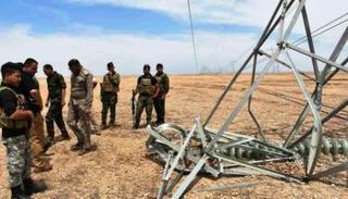 عملية سابقة لاستهداف أحد أبراج الطاقة بالعراق- أرشيفية