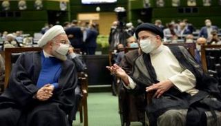 حسن روحاني وإبراهيم رئيسي