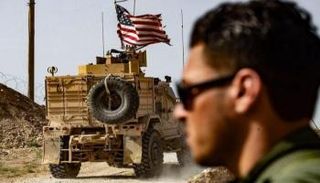جندي وآلية أمريكية في شمالي سوريا